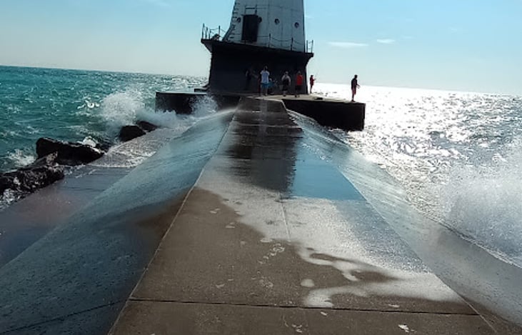 Walk out to the lighthouse at Ludington beach!
