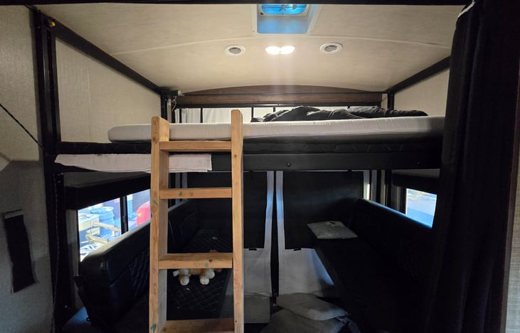 Homemade ladder to reach the top bunk.