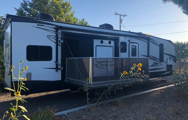 We love the side patio. Keeps the pets and kids safe :)