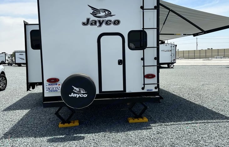 Back door for easy access and storage for kayak, sur**oards, or kiddos bikes and outside chairs.
Bottom bunk inside does fold up for easy access from back door.