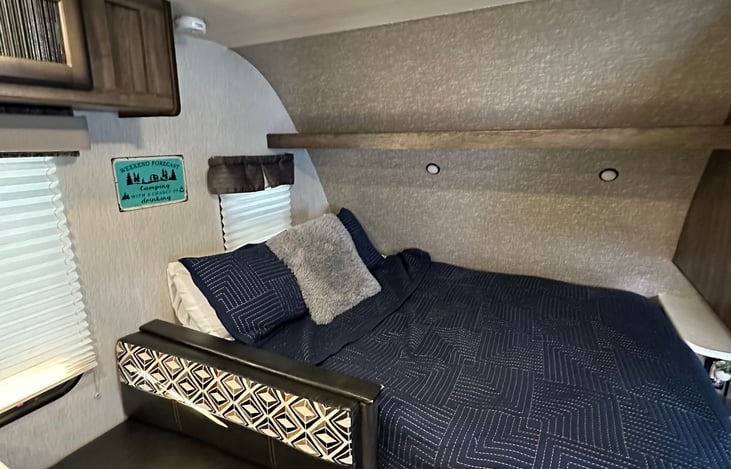 Queen bed has a nice, comfortable matress. Linens are only added by request for a fee.