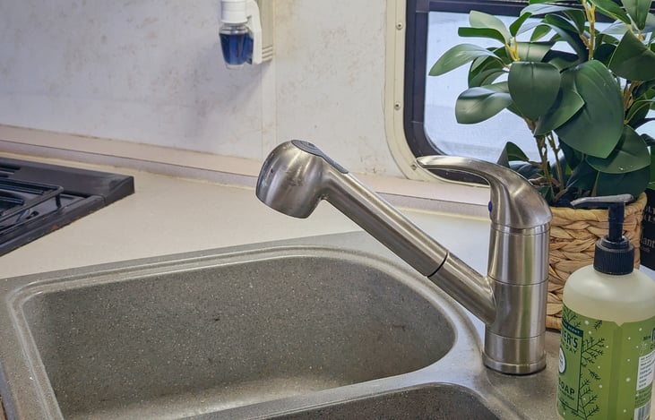 There are 2 sinks in the RV so you'll not have to brush your teeth while Mom's cooking
