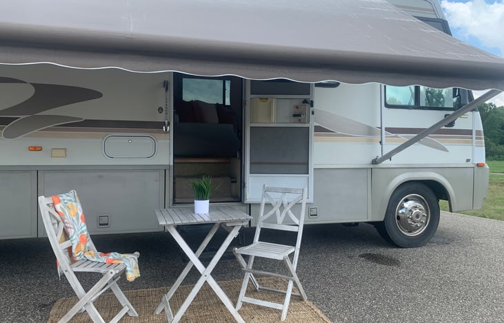 Enjoy the outside under the shade with this patio set.