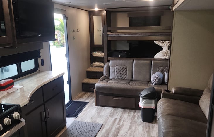 View towards the rear of RV.  The bunk beds are behind the sofa bed.