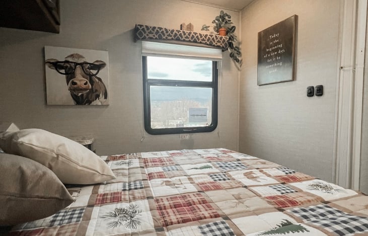 Private master bedroom with queen bed and tv