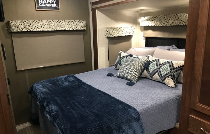 Queen bed with additional 4" Dormeo topper ($380 cost) for the most amazing support and sleep you will find in any RV. Quality bedding and a variety of pillows