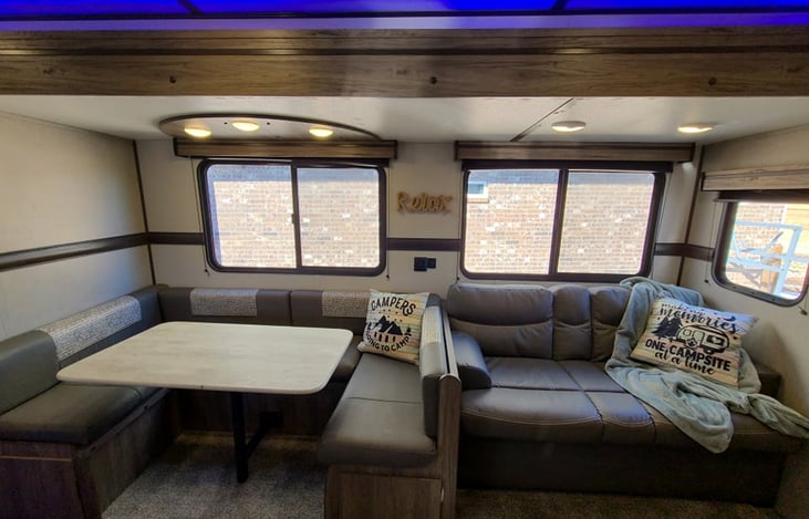 Quality family time around the table or extra bed space.  Dinette and loveseat both make into beds.