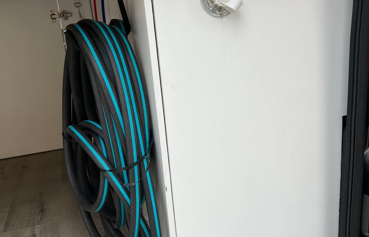 Hose to fill up the 30 gallon water tank.