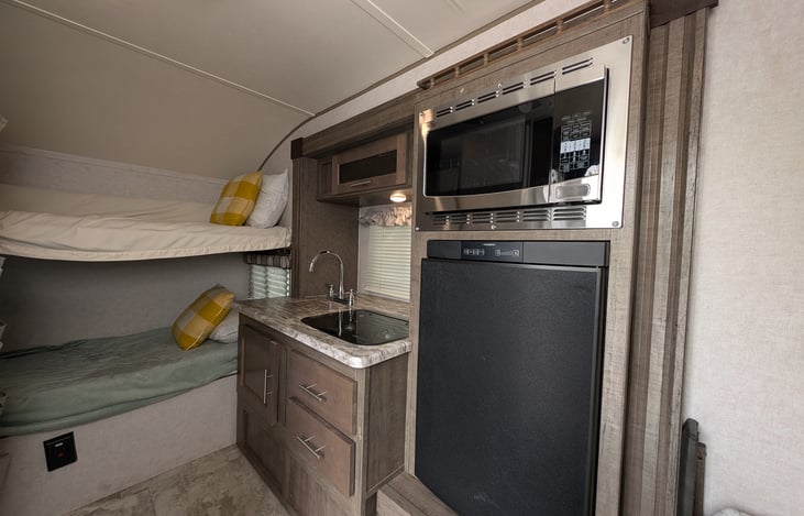 Full kitchen inside and 2 bunks