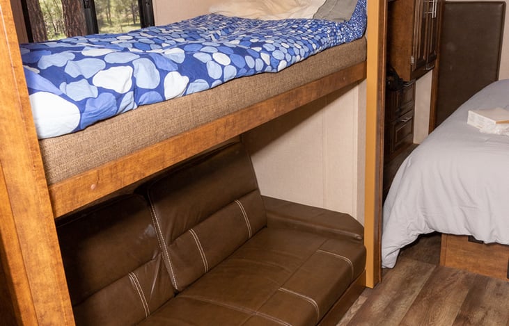Bunkbeds in the Hallway. Bottom bed is a Jackknife bed