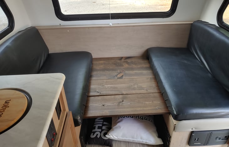 The front dinette converts to a small twin bed. Very comfy for a not too large person.