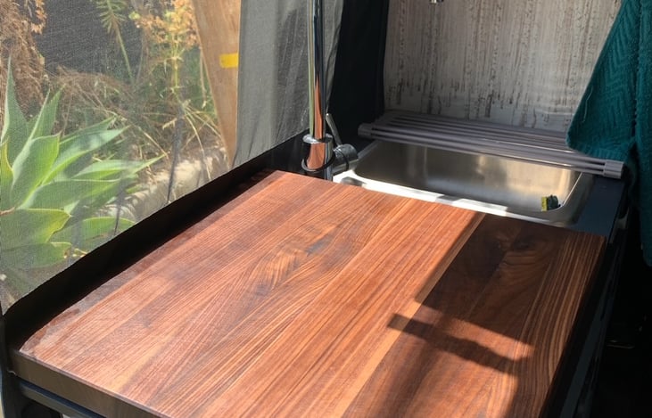 Custom cut butcher block for easy cutting and cooking.