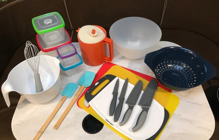 Variety of bowls, cutting boards and colander