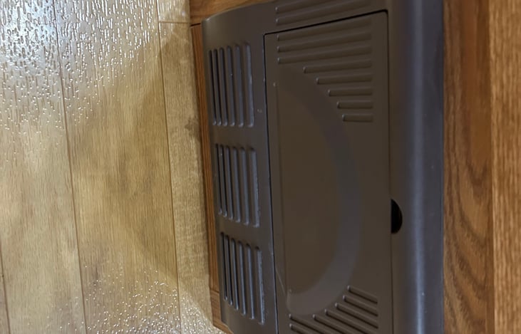 Electric panel box is located under the closet next to the sink