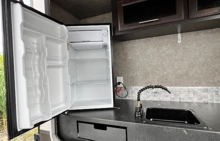 Outdoor sink, refrigerator, storage drawer