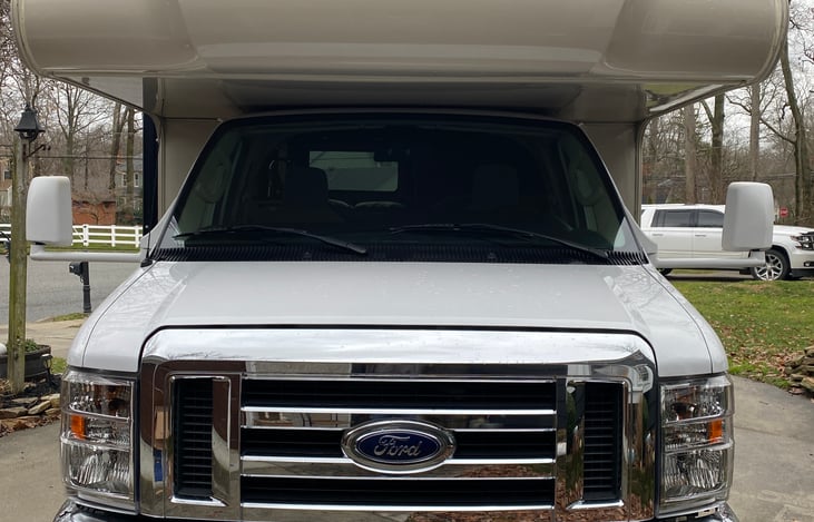 Almost looks like the camper is smiling. It must know that fun lies just 'round the corner.