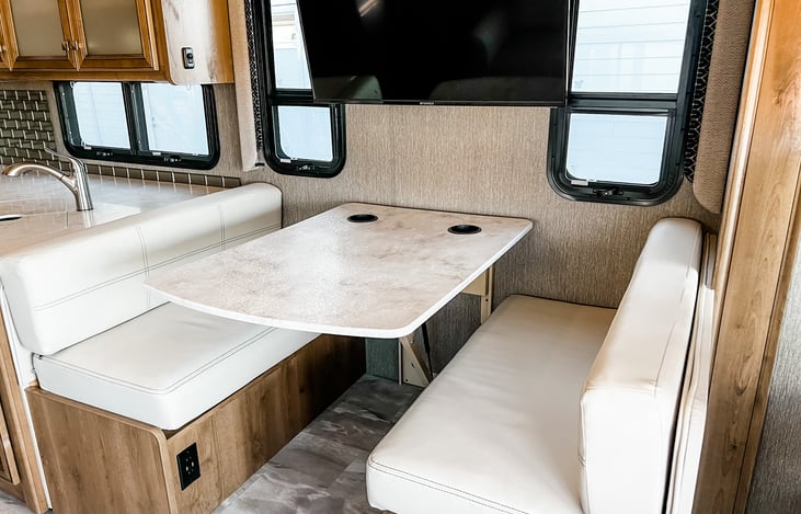 Dining table that folds into bed