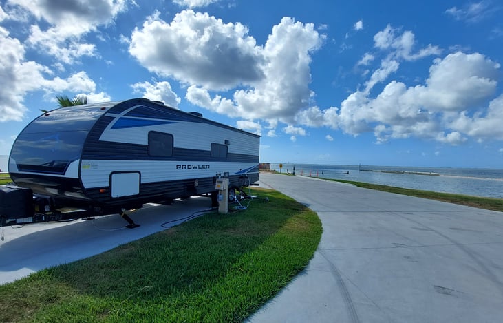 Full Hook ups at the Back end. Our Camper comes with all adapters needed for full hookups at your sitw