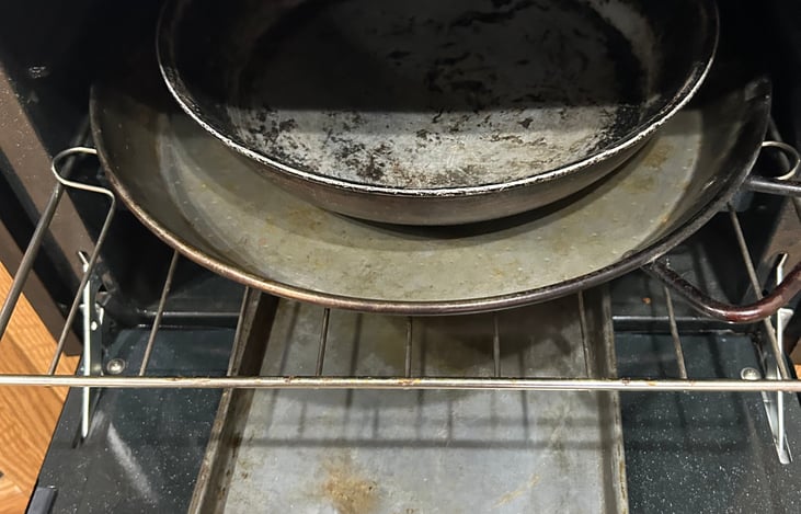 Larger size pans stored in the oven