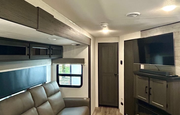 Living room: smart tv, fireplace, massage/heating/reclining couch