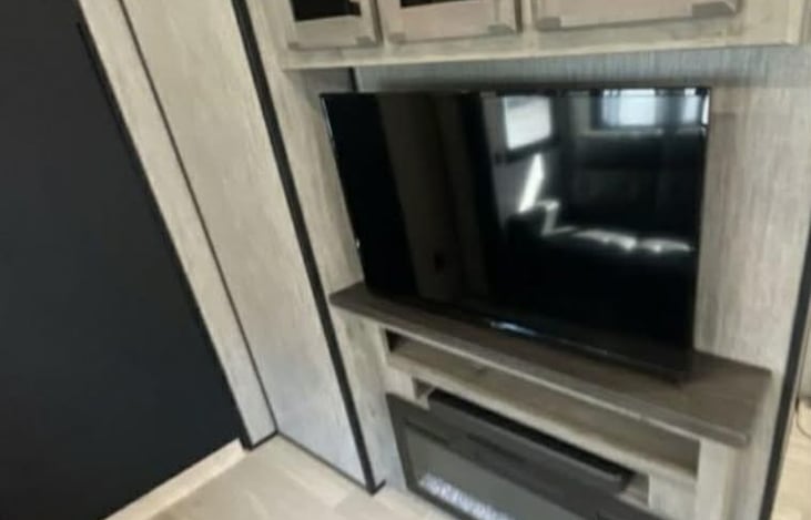T.V with fireplace.