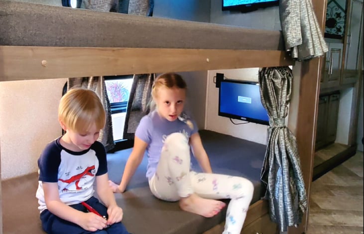 Kids love the bunk beds and drop down bunk!