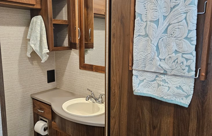 Restroom with tons of storage.