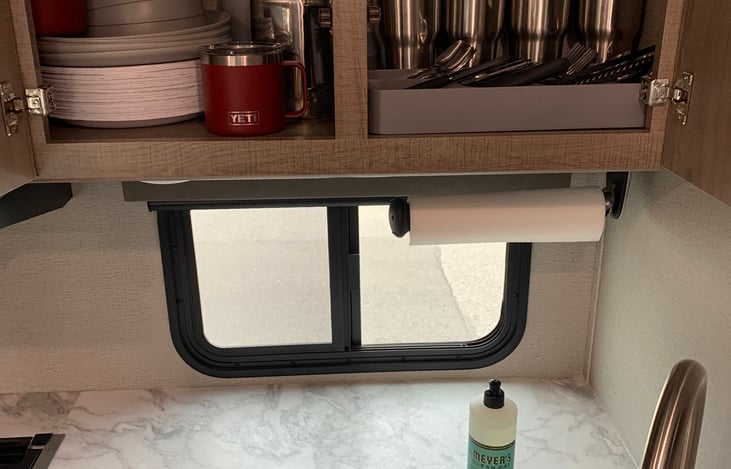 Window near the kitchen sink.