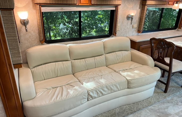 Queen pull out couch with Spring/Air mattress.