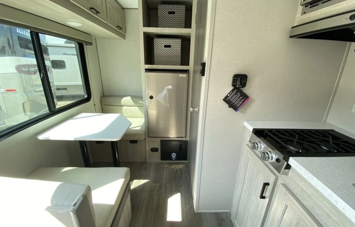 Dinette makes into bed.  I'm 5'8" and I fit comfortably in this bed.