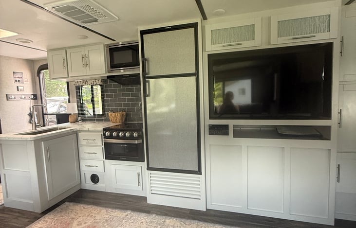 Kitchen and TV view from couch.