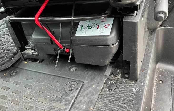 Tool kit under the driver side, including jack.