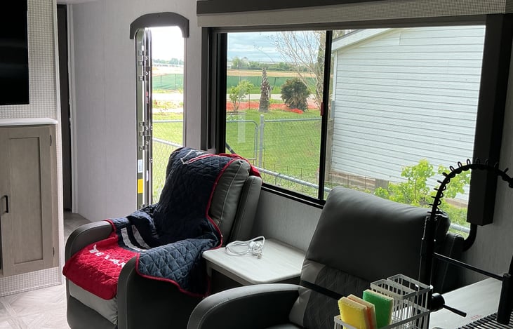 Two recliners for checking out the view out the large size window