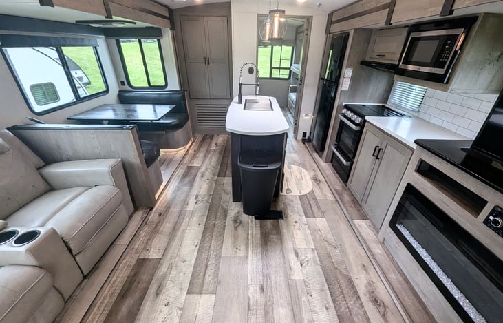 Spacious galley and fully-equipped kitchen. Plenty of room for everyone. Private bunkhouse and private bedroom on opposite ends. Pop-up TV to keep everyone entertained. Ample storage.