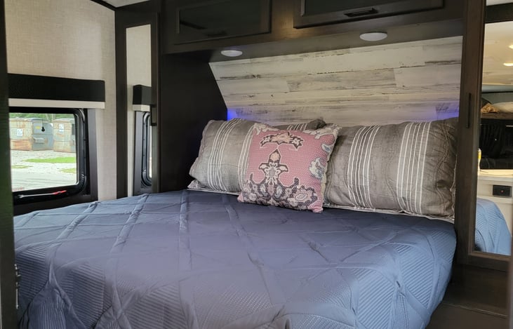 Queen size bed with storage closets on each side along with power and USB plug ins for all your devices!