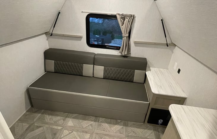 Private bunkhouse with bunks pushed up. Couch pulls out to a queen sized bed!