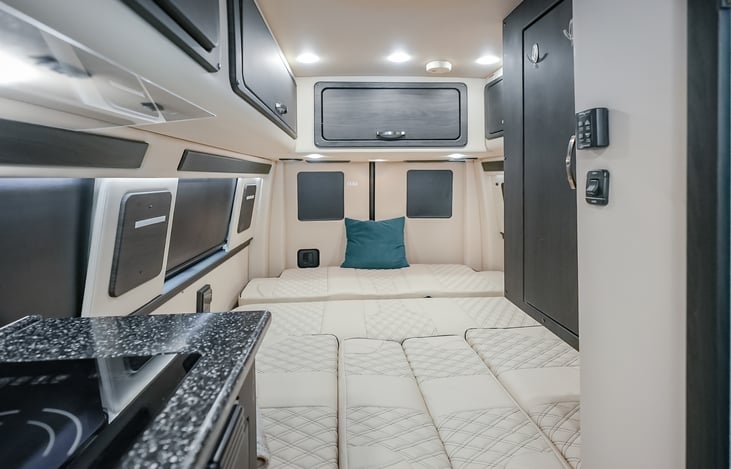 This is large bed sleeps 2 and the back sofa reclines and it is electric :)