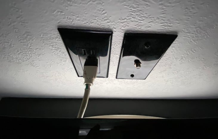 Bunkhouse: dual power outlet and cable outlet