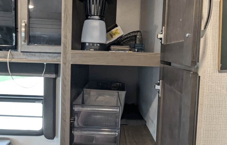 Storage closet/cabinets offer plenty of space
