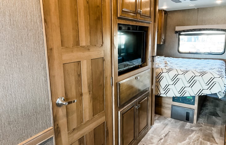 Bunk tv and bathroom