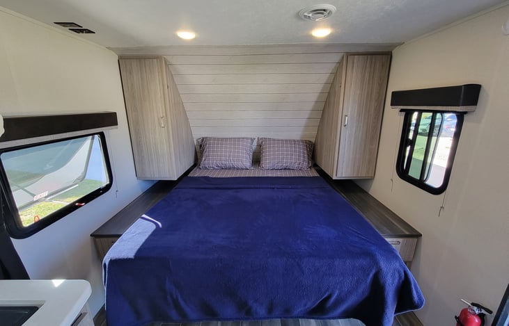 Queen size bed with 3 inch gel memory foam mattress topper. Blanket sheets and pillow available