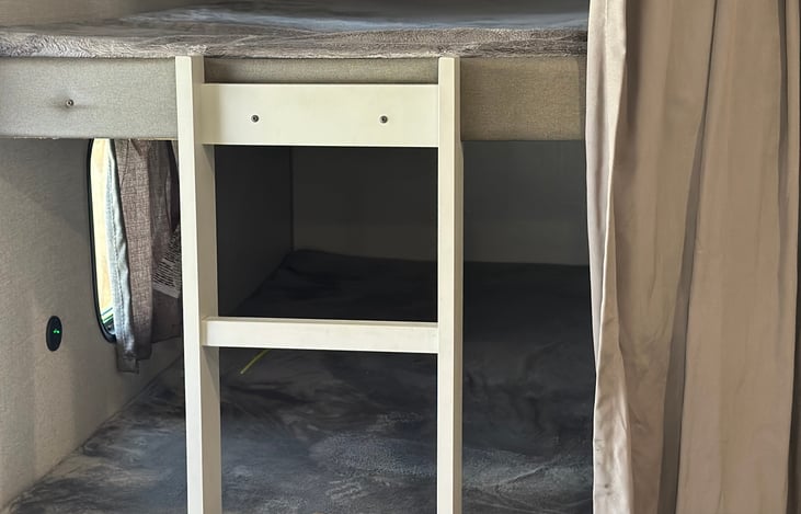 Bunk beds with privacy curtain