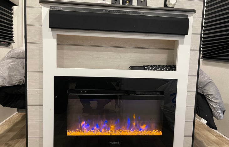 Fireplace and electric heater