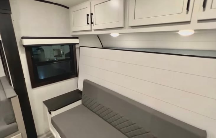 Seating area. Can convert to two grown-up sleeping bed.