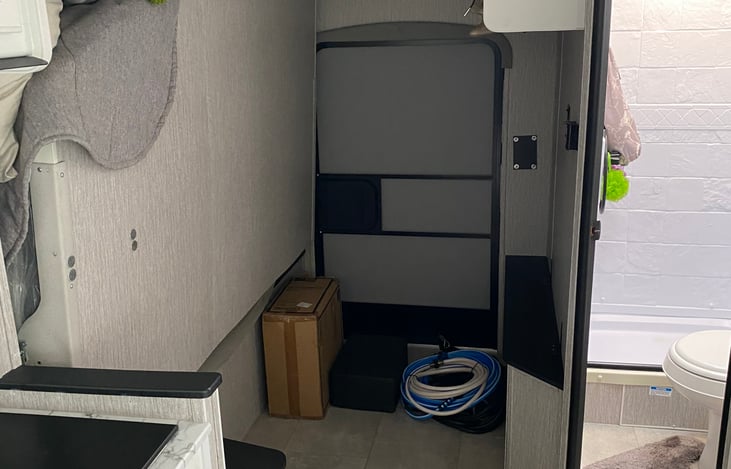 Murphy Bed upright position. Much storage space for bicycles, extra equipment, chairs etc.