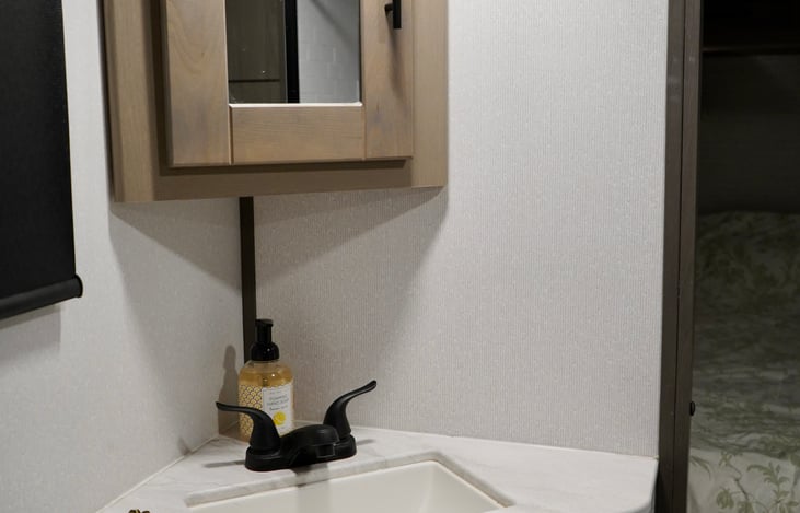 Shower and toilet room. Sink.