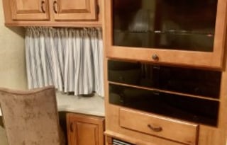 A 5th wheel travel trailer suited for 2 people