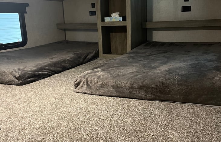 2 twin size beds in loft area. You will need to provide pillows and linens if you need to utilize this area.