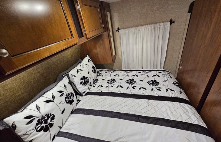 Queen bedroom can be completely closed with wooden doors for privacy