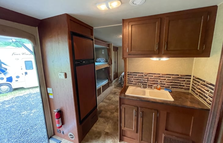 Kitchen and hallway to sleeping area